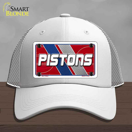 White cap with 'Pistons' design on a gray background