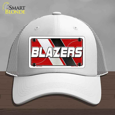 White cap with 'BLAZERS' logo on a gray background