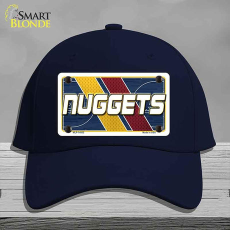Navy blue cap with 'NUGGETS' design on a gray background