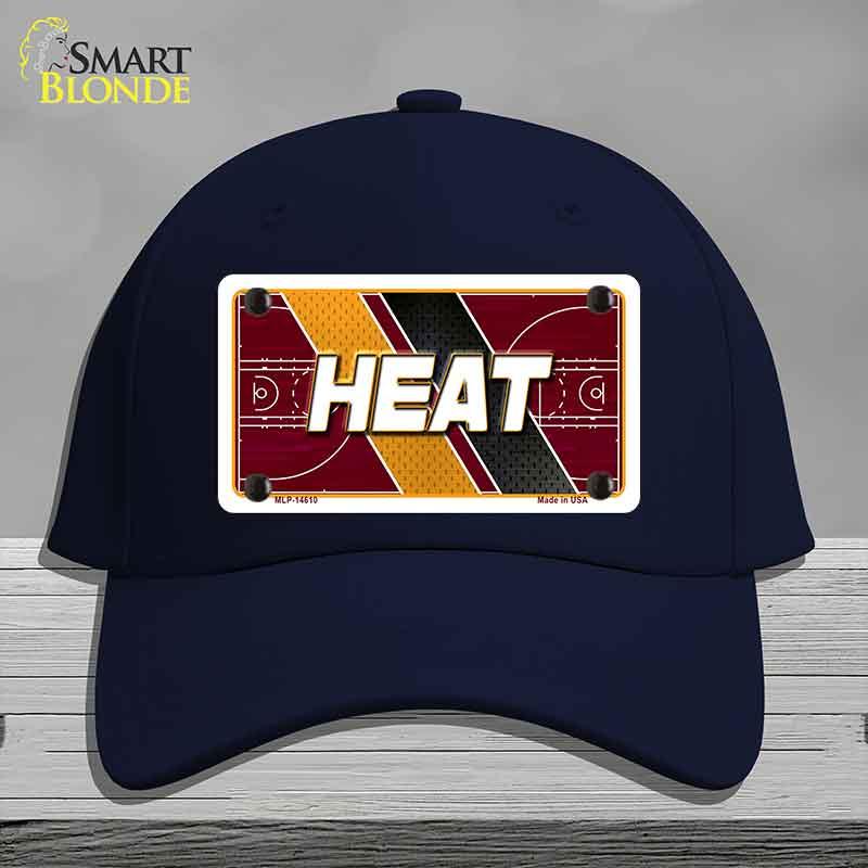 Navy blue cap with 'HEAT' design on a gray background
