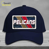 Navy blue cap with 'Pelicans' logo on a gray background