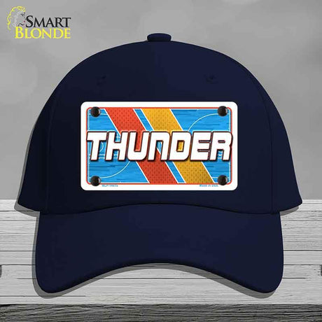 Navy blue cap with a colorful 'THUNDER' license plate design on a gray background