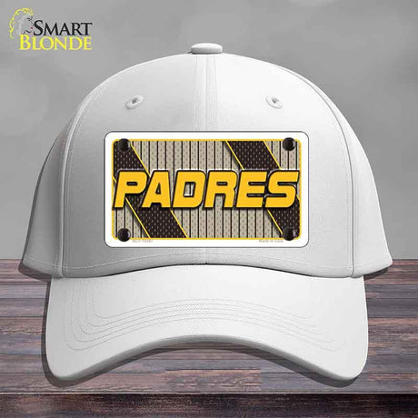 White cap with 'PADRES' logo on a wooden surface and gray background