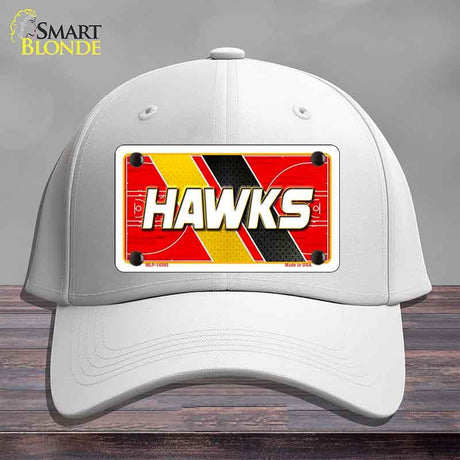 White cap with a red and yellow 'HAWKS' license plate design on a gray background