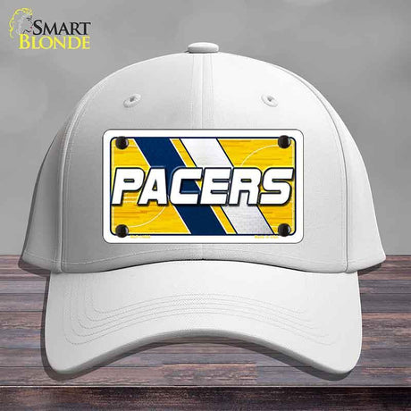 White cap with a 'Pacers' logo on a gray background