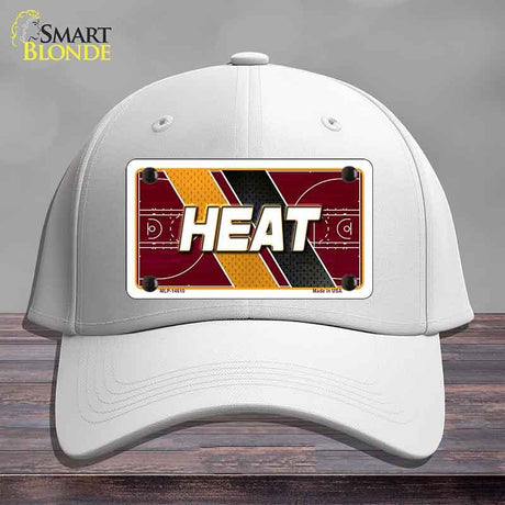 White cap with 'HEAT' design on a gray background