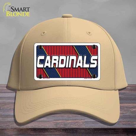 Beige cap with 'Cardinals' logo on a wooden surface