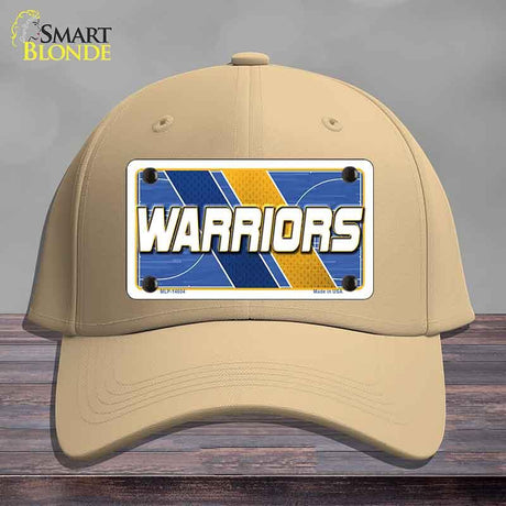 Beige cap with 'Warriors' license plate design on a wooden surface