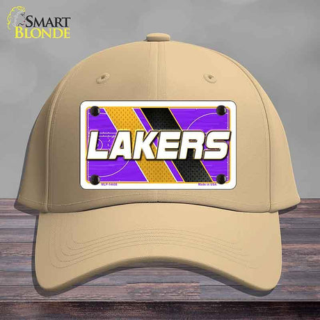 Beige cap with Lakers logo on a wooden surface