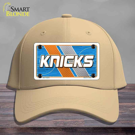 Beige cap with a 'Knicks' license plate design on a gray background