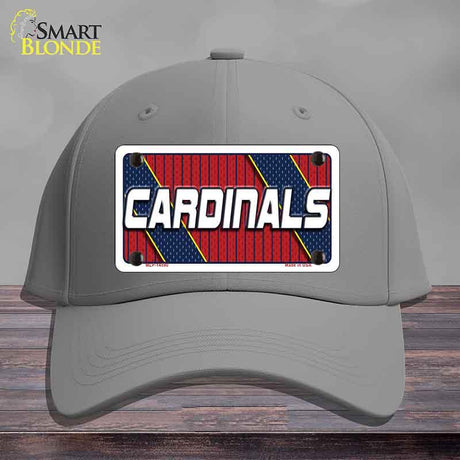 Gray cap with 'Cardinals' logo on a wooden surface