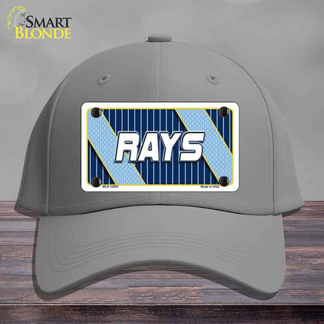 Gray cap with a 'RAYS' license plate design on a wooden surface
