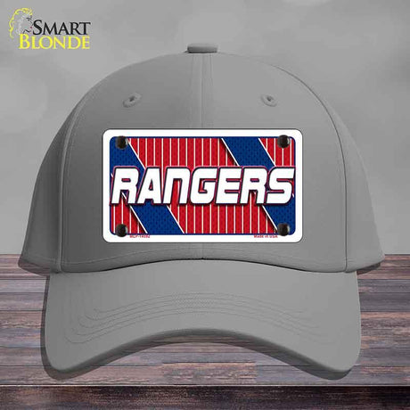 Gray cap with a 'Rangers' logo on a wooden surface