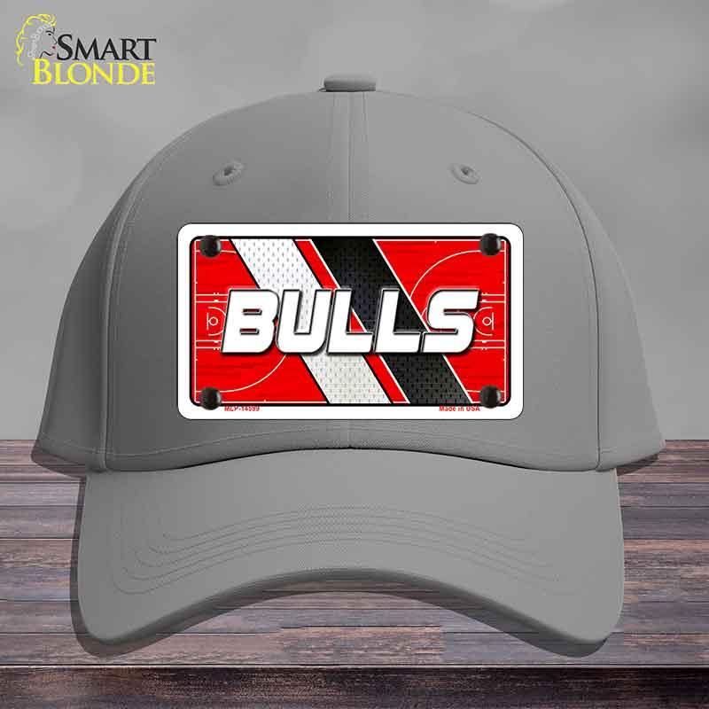 Gray cap with a 'BULLS' license plate design on a wooden surface