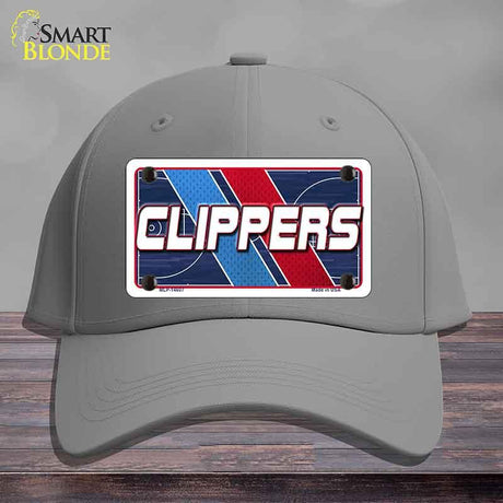 Gray cap with 'CLIPPERS' logo on a wooden surface