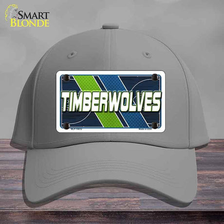 Gray cap with a 'Timberwolves' license plate design on a wooden surface.