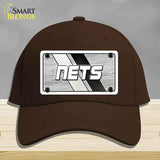 Brown cap with 'NETS' logo on a gray background