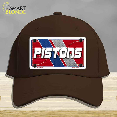 Brown cap with 'PISTONS' logo on a gray background