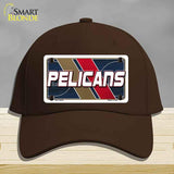 Brown cap with a 'Pelicans' license plate design on a gray background