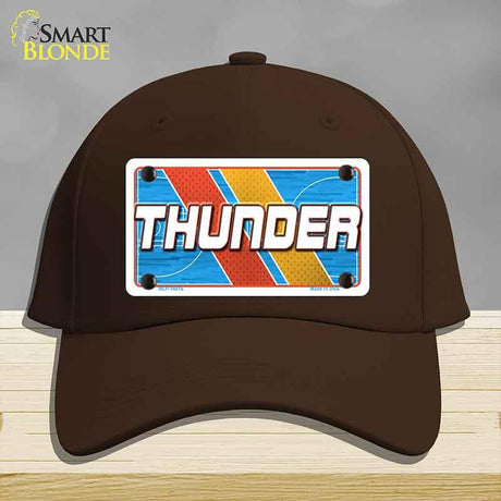 Brown cap with a 'THUNDER' license plate design on a gray background