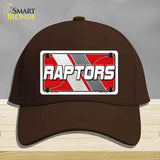 Brown cap with 'RAPTORS' logo on a gray background