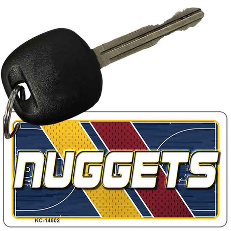 Key with a 'Nuggets' keychain on a white background