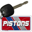 Key with a 'Pistons' keychain on a white background
