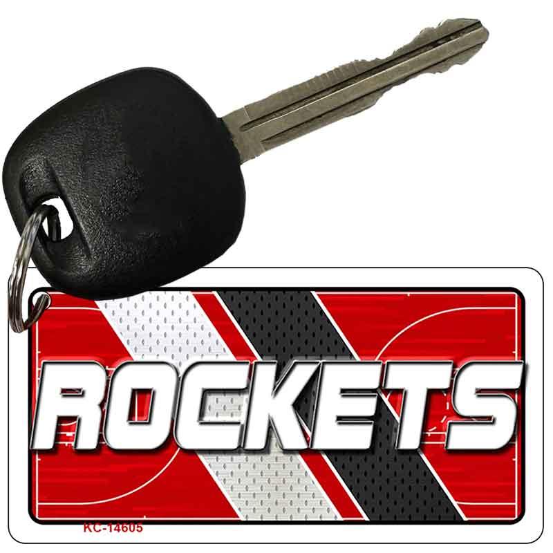 Key with a 'ROCKETS' keychain on a white background