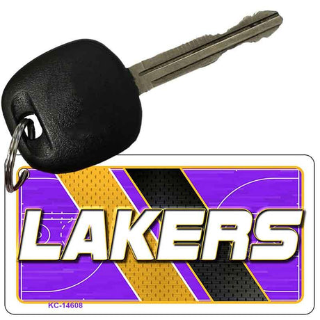 Key with a Lakers keychain on a white background