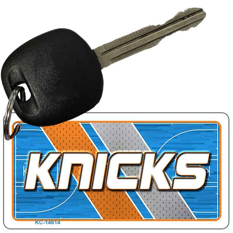 Key with a 'Knicks' keychain on a white background