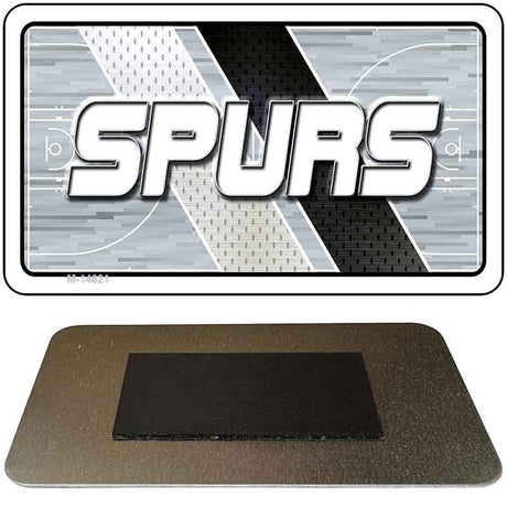 Metallic card with 'SPURS' text on a sports-themed background