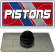 Metallic badge with 'PISTONS' logo on a red, white, and blue background