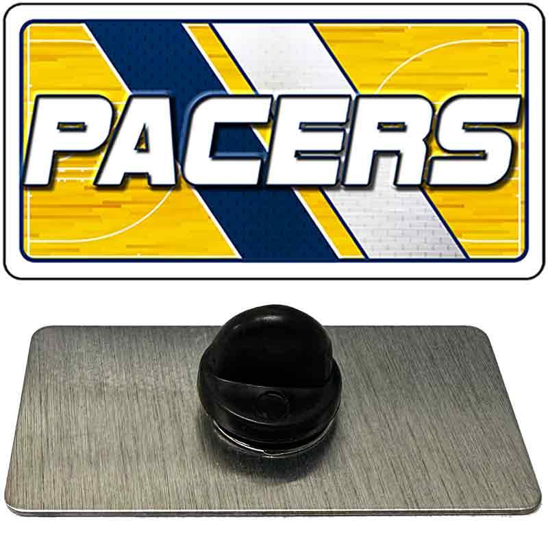 Pin with 'Pacers' logo on a yellow, blue, and white striped background