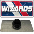 Black rubber grommet on a gray mat with 'Wizards' logo in the background