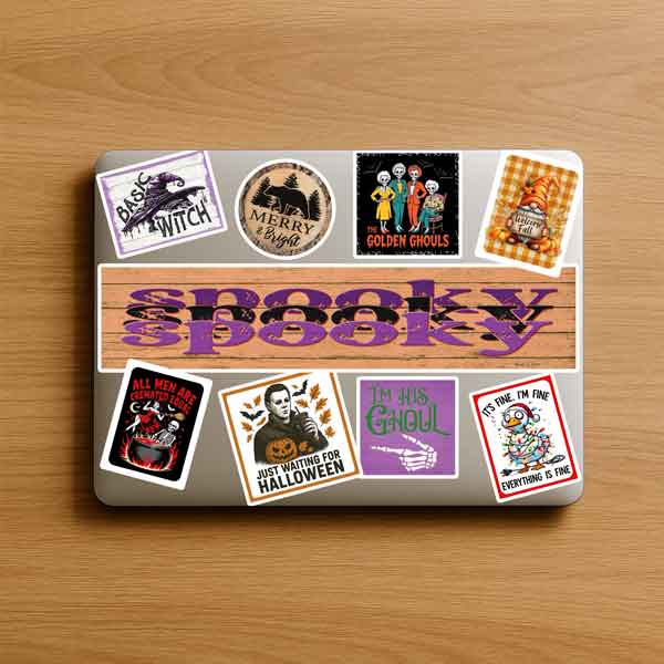 Halloween-themed sticker set on a wooden surface