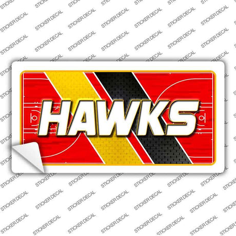 Sticker with 'HAWKS' text on a red, yellow, and black background